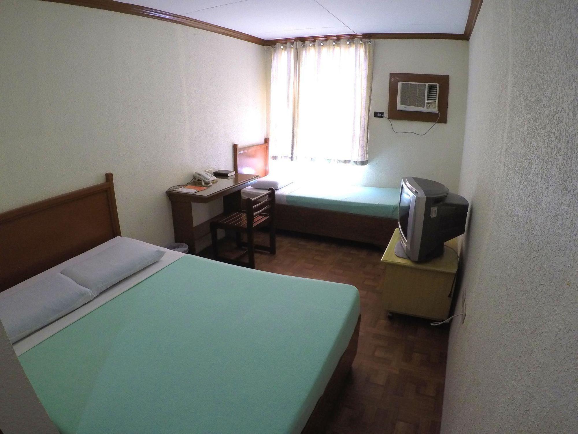تيغيغيوراو Ivory Hotel And Suites المظهر الخارجي الصورة